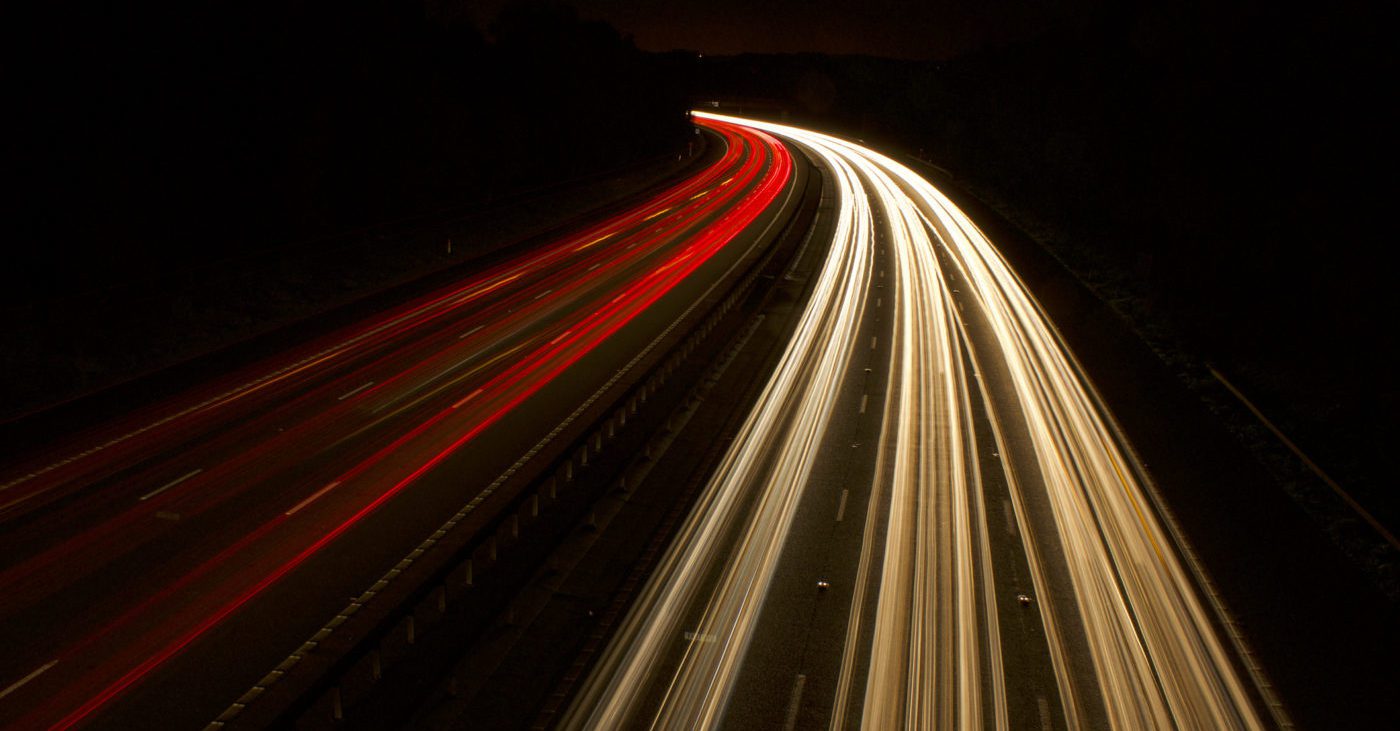 lights curving through the darkness, illustrating the concept of electrical impedance control in circuit design and signal integrity