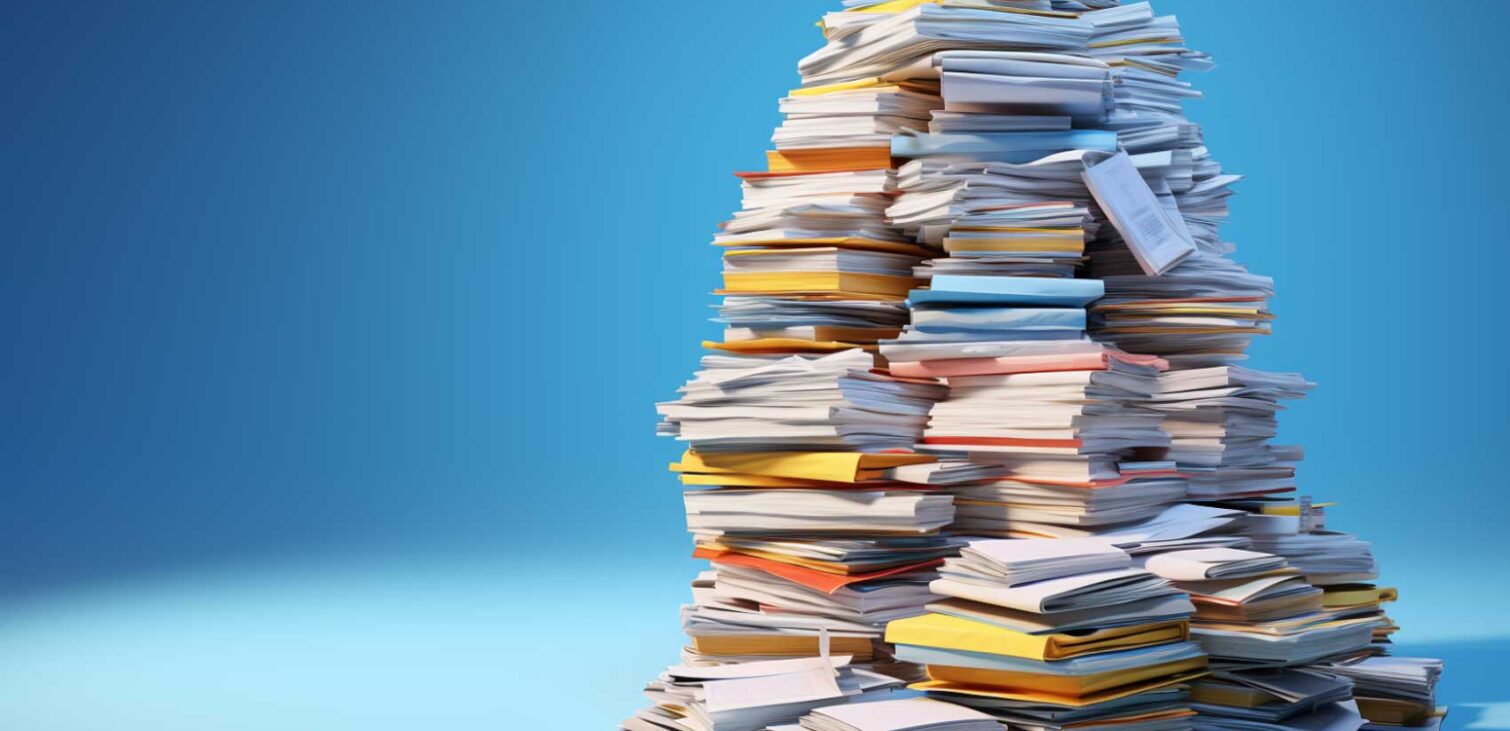 Document Generation - academic books and journals stacked in a pile